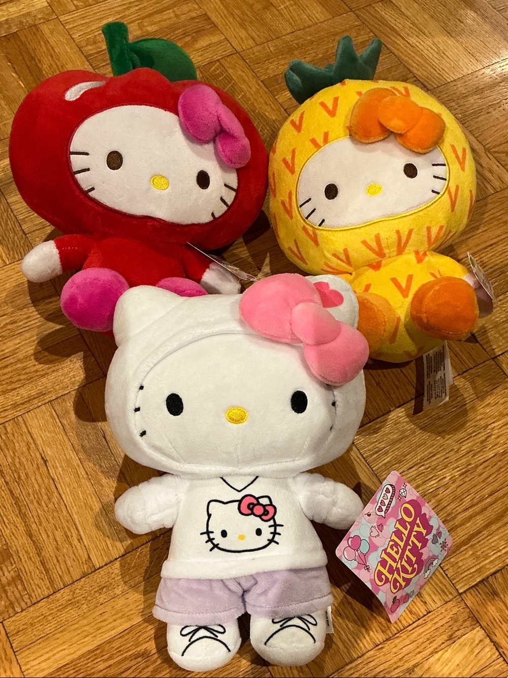 Hello Kitty Lot of 3 plushies- Apple, Pineapple and sweatshirt Hello Kitty, new